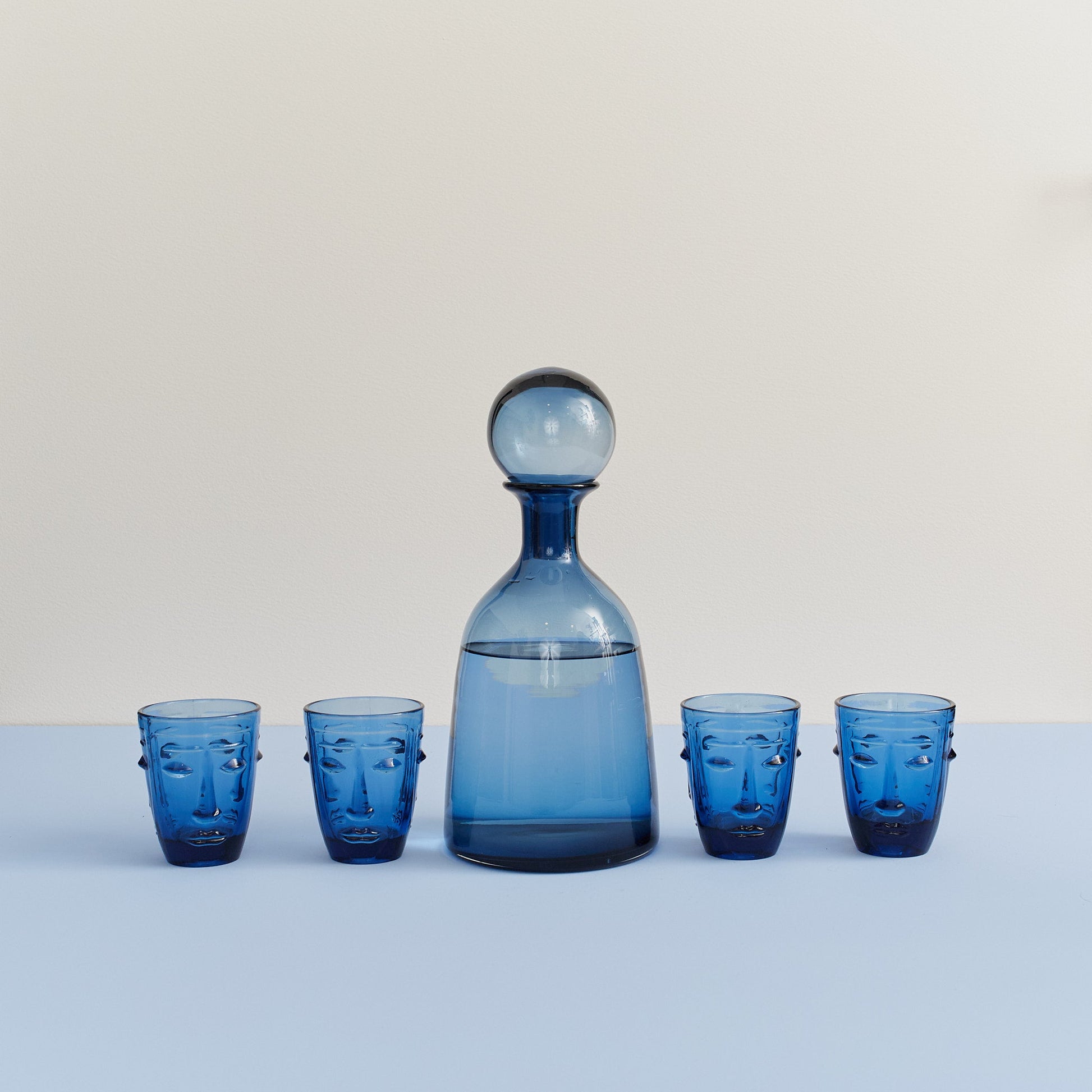 Blue Glass Goblet Face Common Things