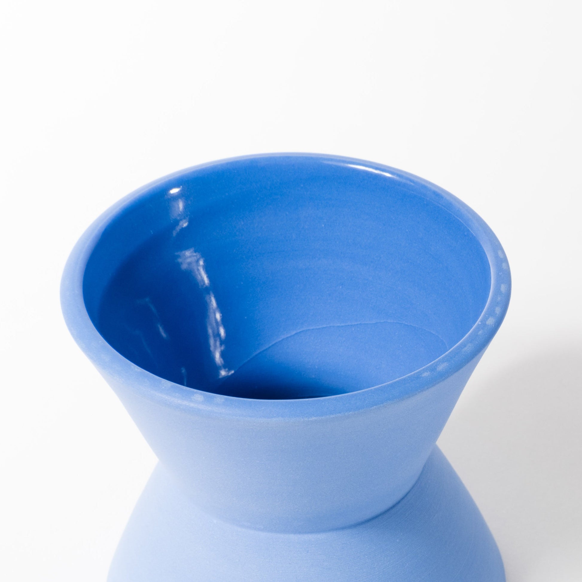 Blue cup X-shaped Common Things
