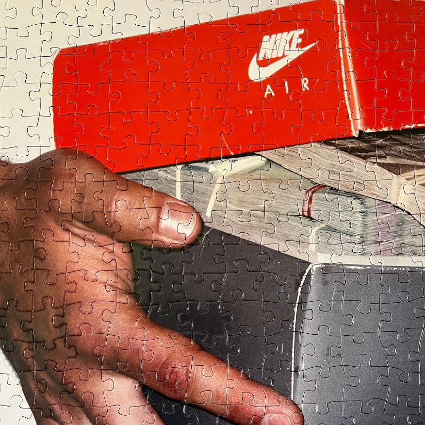 Rubber Bands and a Shoebox Jigsaw Puzzle by Paul Labonte